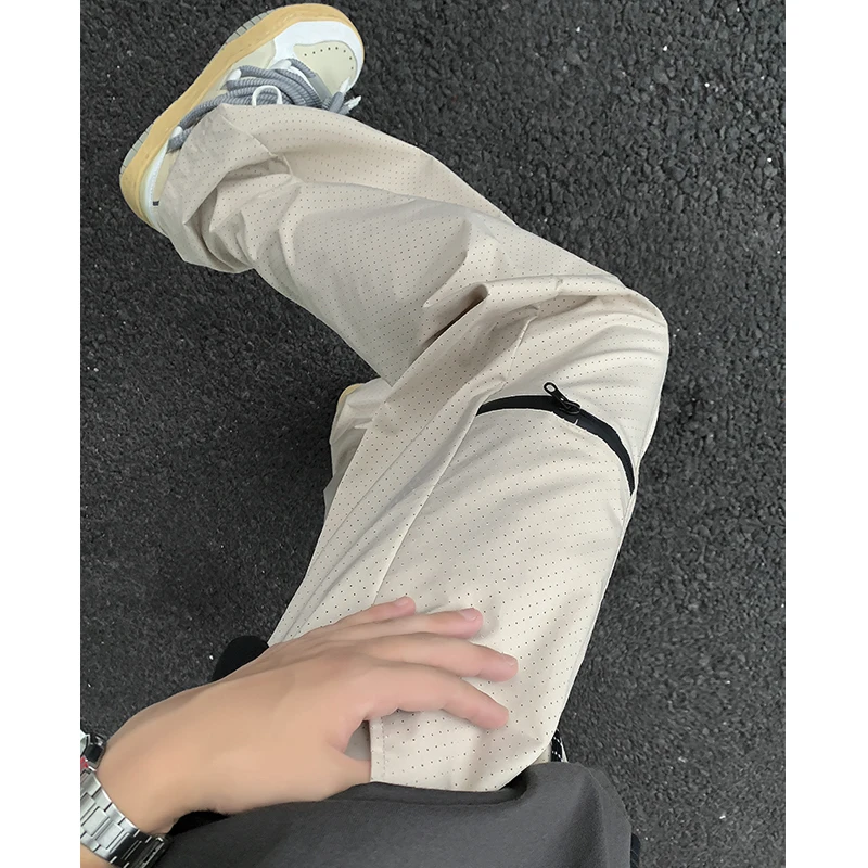 

Una Reta Man Pants Summer New Harajuku Hip Hop Zipper Pants Men Fashion Loose Vintage Casual Trousers