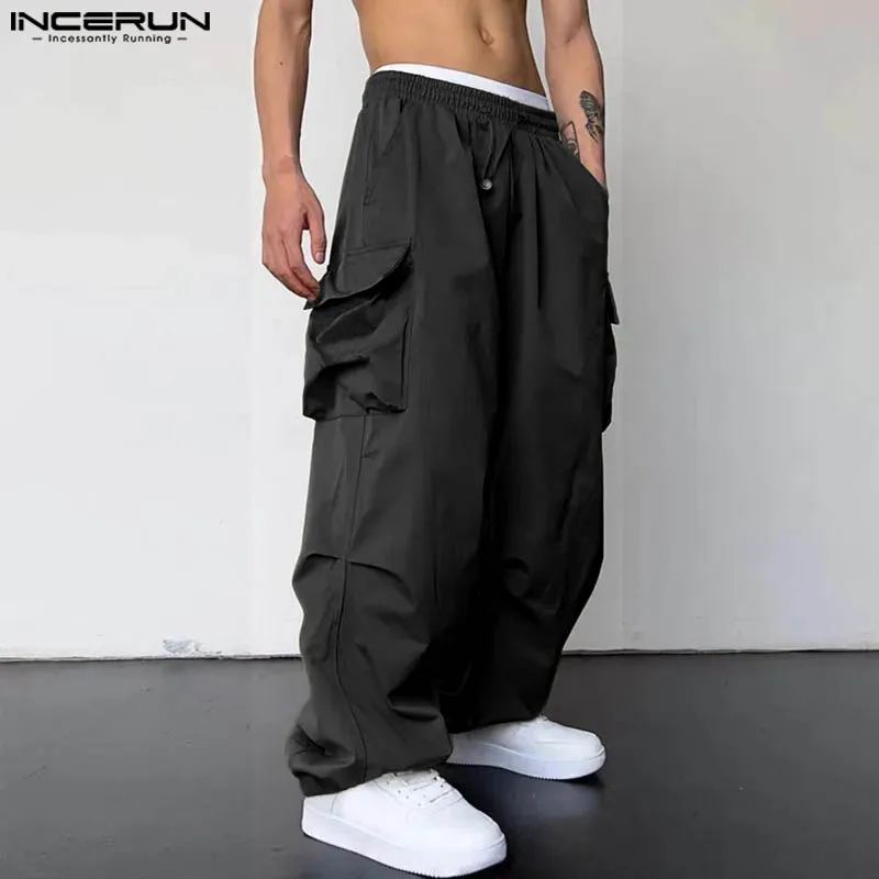 

INCERUN Men Cargo Pants Solid Color Drawstring Loose Joggers Casual Trousers Men Streetwear 2024 Fashion Male Long Pants S-5XL