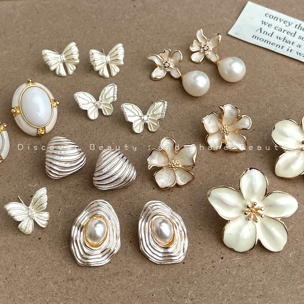 

DIY accessories French milk white dripping oil flower zircon stud earrings sweet temperament butterfly earrings light luxury ele