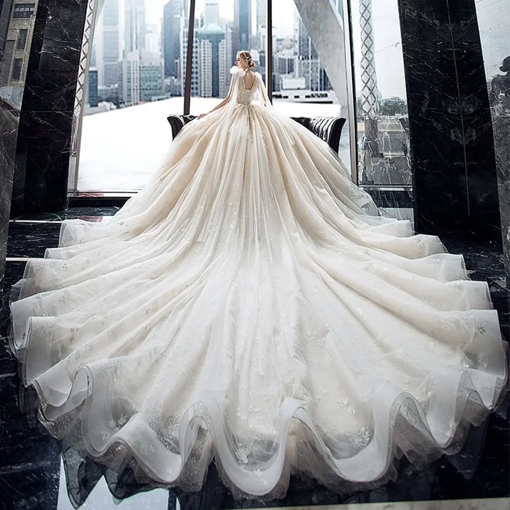 Luxury Chapell Train ชุดแต่งงาน Tulle V คอถังโบว์ไหล่ลูกปัดคริสตัลเงาชุดบอลชุดเจ้าสาว vestido de novia