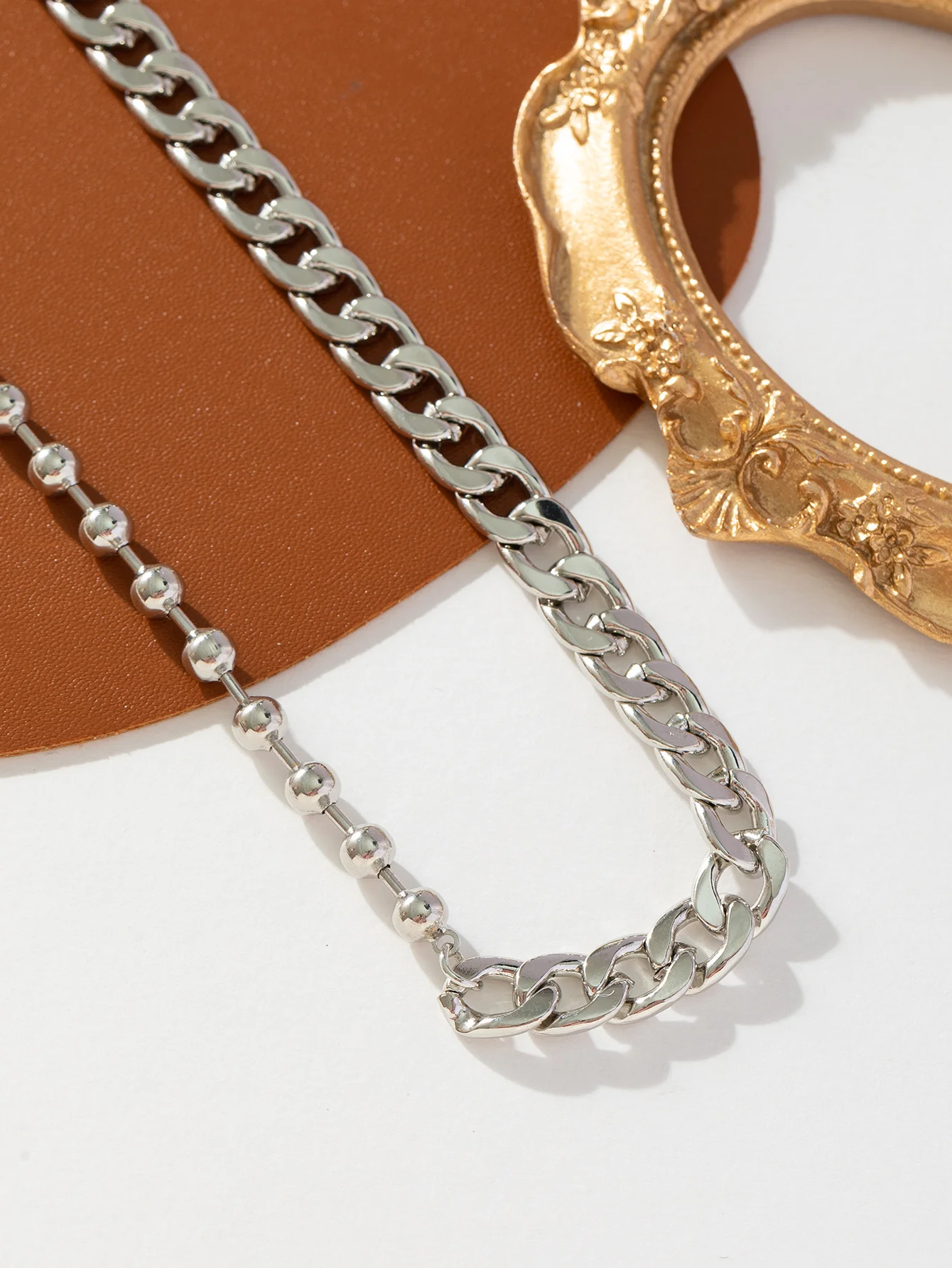 This half-beaded necklace is a fashionable and dazzling style. It's a simple and elegant gift for family members to wear at even