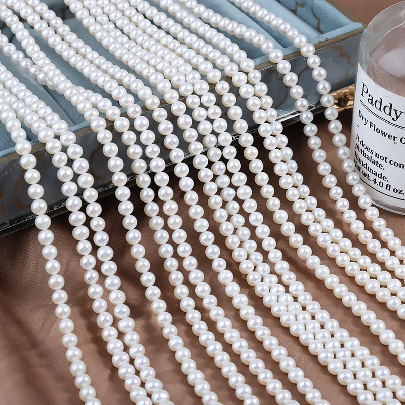 A strand of nearly round natural freshwater pearls, 5.5-6mm in size, with a total length of 39cm and approximately 68 beads.