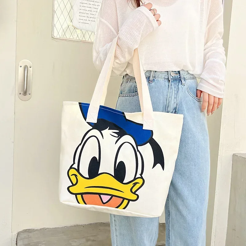 Disney 2025 New Cartoon Mickey Minnie Ladies Handbag Student Fashion Canvas Shoulder Bag Donald Duck Large Capacity Shopping Bag