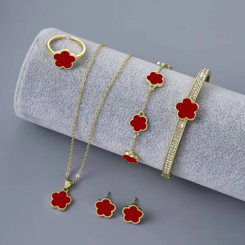 

Hot Selling Plant Five Leaf Flower Plum Blossom Jewelry Set Acrylic Creative Bracelet Necklace Earrings Women's Stainless Steel