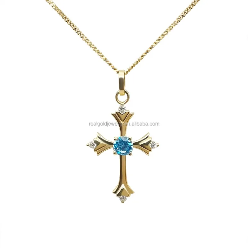 

Real gold cross pendant necklace with single blue zircon.