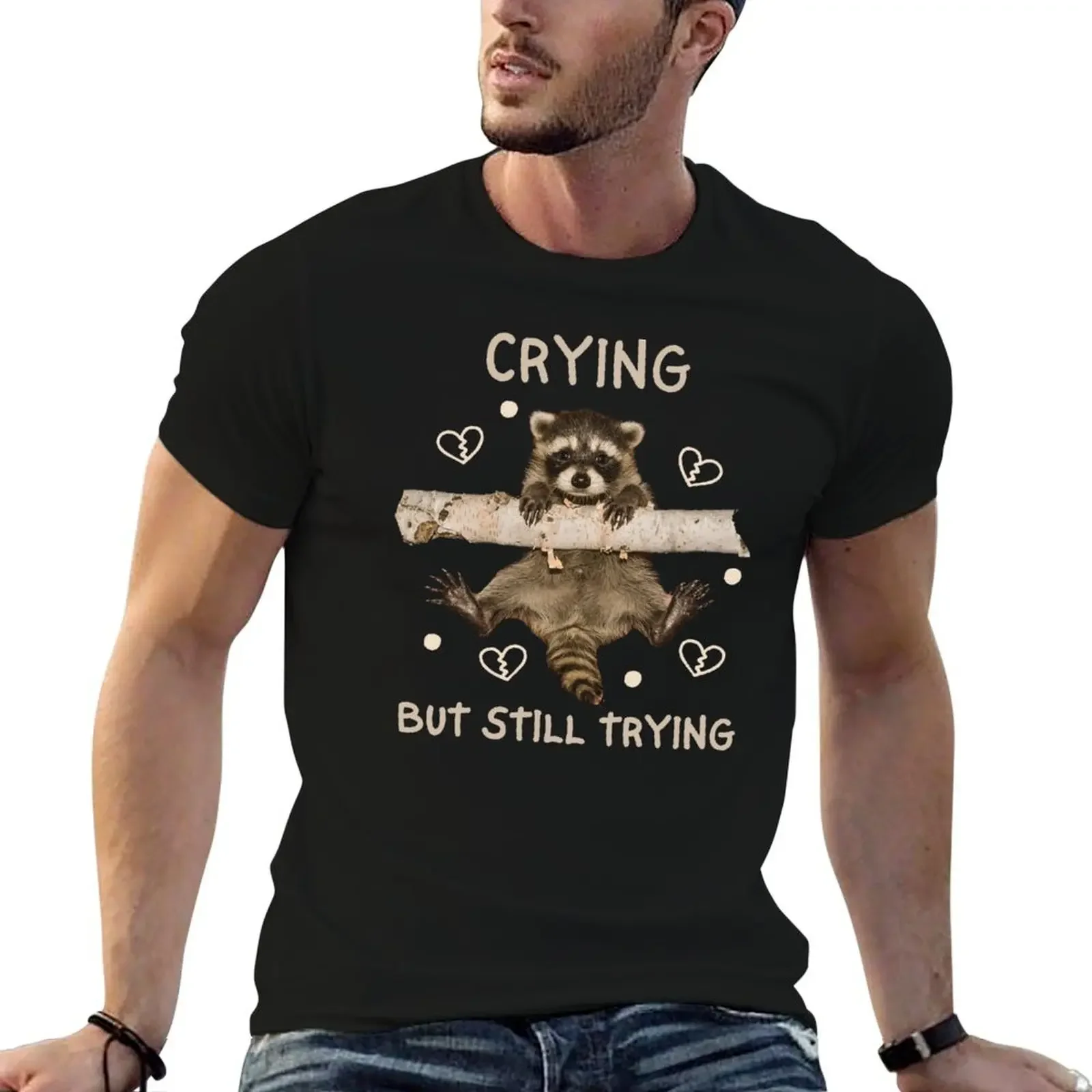 

Crying But Still Trying Funny Raccoon Mental Health T-Shirt graphic t shirts vintage mens vintage t shirts