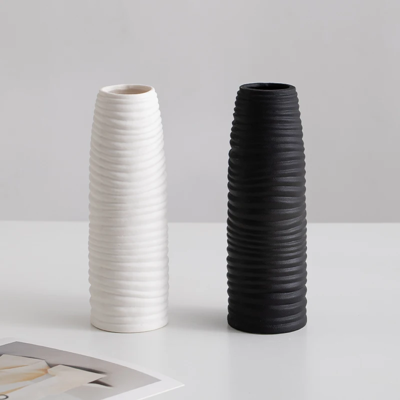 

Nordic minimalist black matte ceramic dried flower vase for home living room, a decorative flower arrangement and plant containe