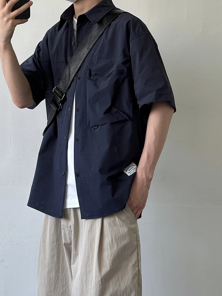 قميص عمل أمريكي عتيق الطراز بأكمام قصيرة، فضفاض، غير رسمي، مناسب للجنسين، تصميم صيفي جديد، جاكيت قميص بأكمام نصفية