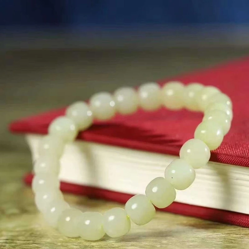 

Natural Hotan Jade Ruoqiang Yellow Material Gradual Color Old Style Bead Bracelet
