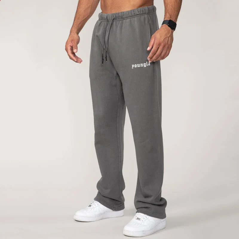 Men's sweatpants in autumn and winter new gym sports fitness cotton printed bouquets foot leisure pants.