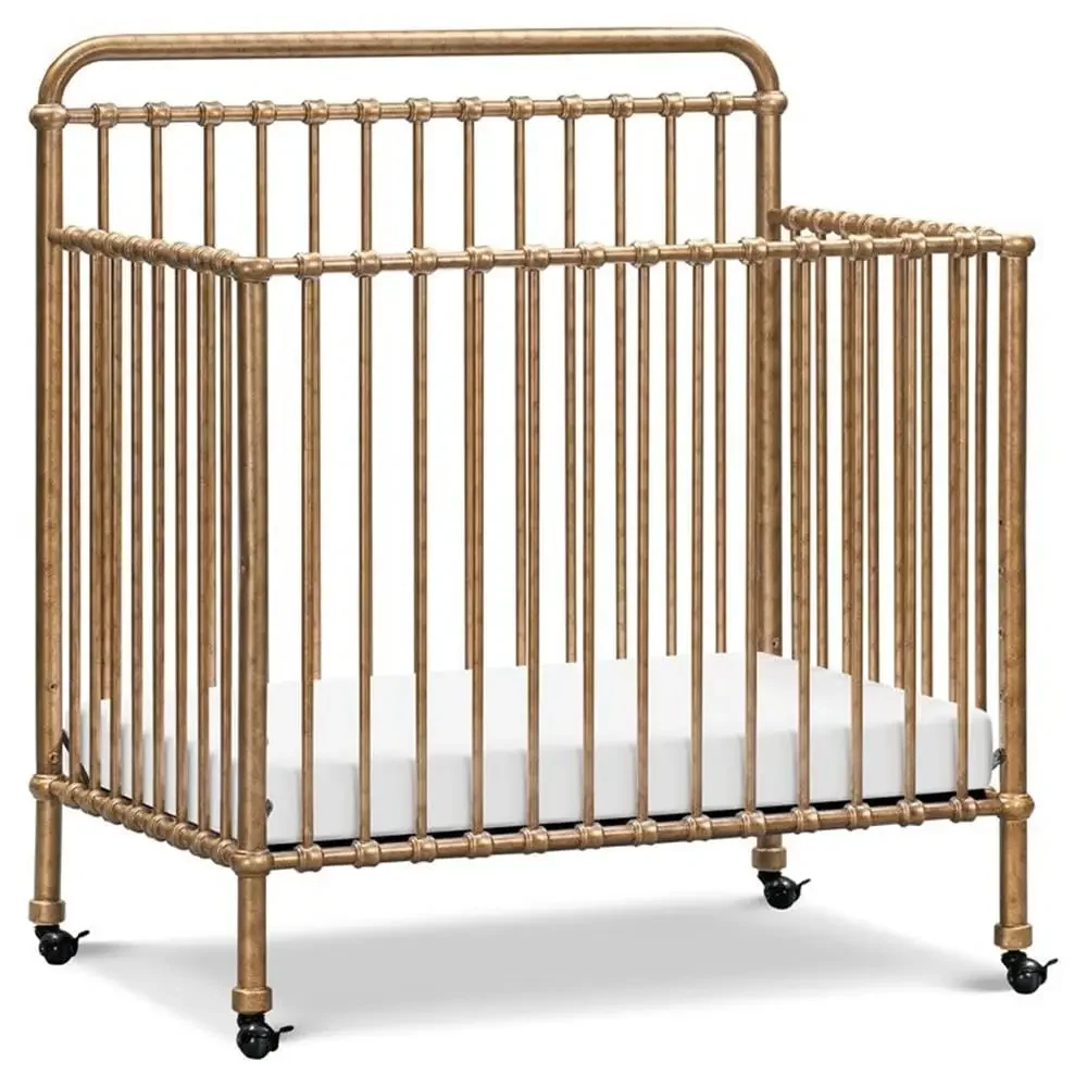 NAMESAKE Winston 4-in-1 Convertible Mini Metal Crib in Vintage Gold, Greenguard Gold Certified