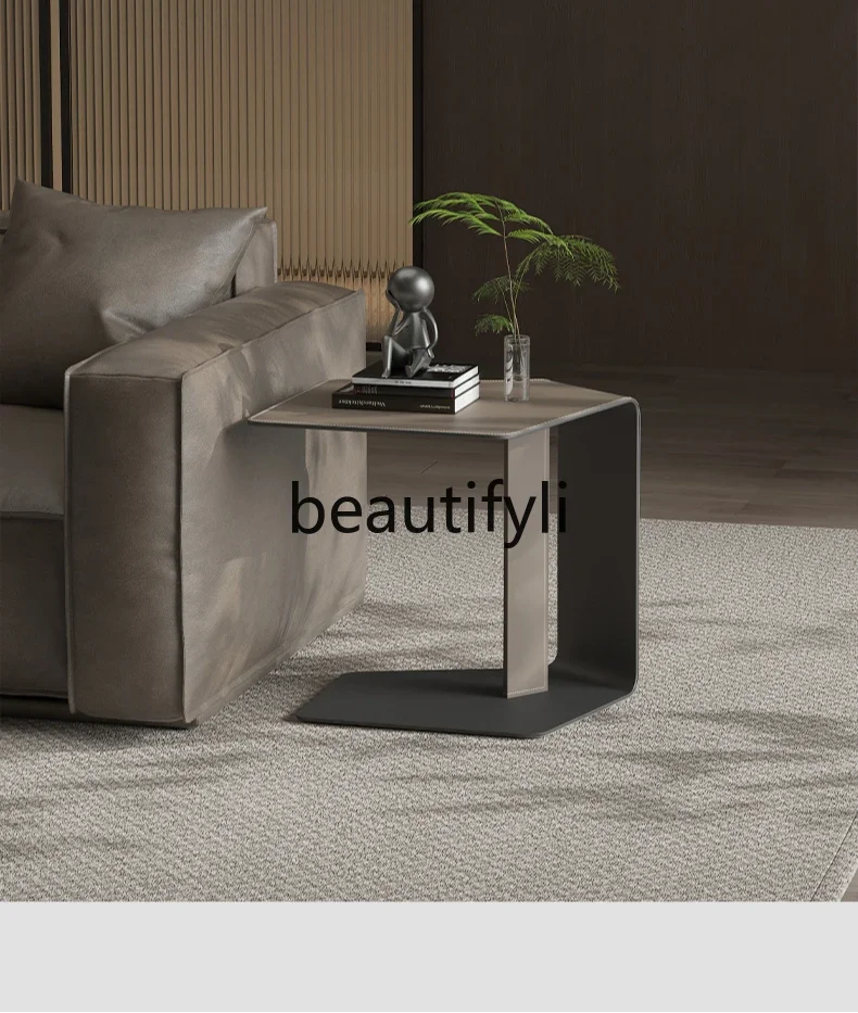 

Italian minimalist sofa side a few saddles leather corners a few light luxury high-end creative small coffee table table