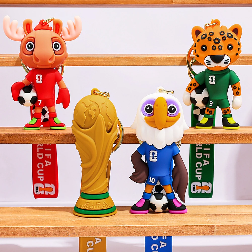 2026 Nuovo calcio IP mascotte squadra di calcio figura in PVC borsa fascino partita di calcio portachiavi souvenir per bambini e fan di Natale