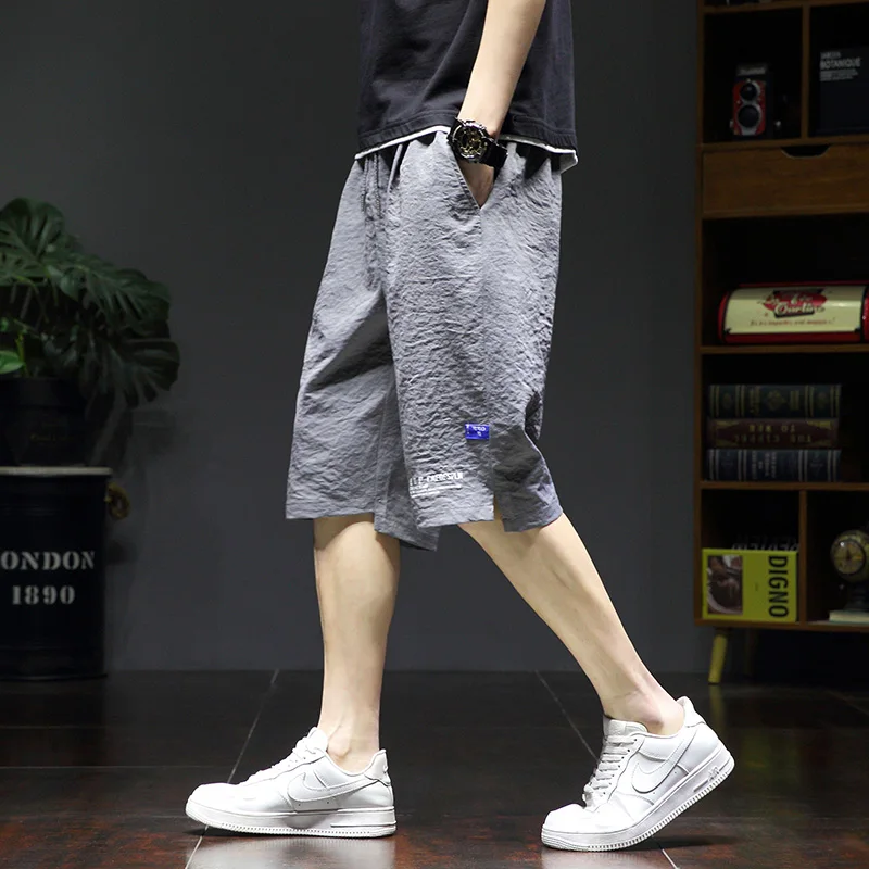 Sports Stylish Printed Casual Shorts Summer Korean Loose Straight Men's Clothing All-match Youthful Vitality Elastic Knee Pants