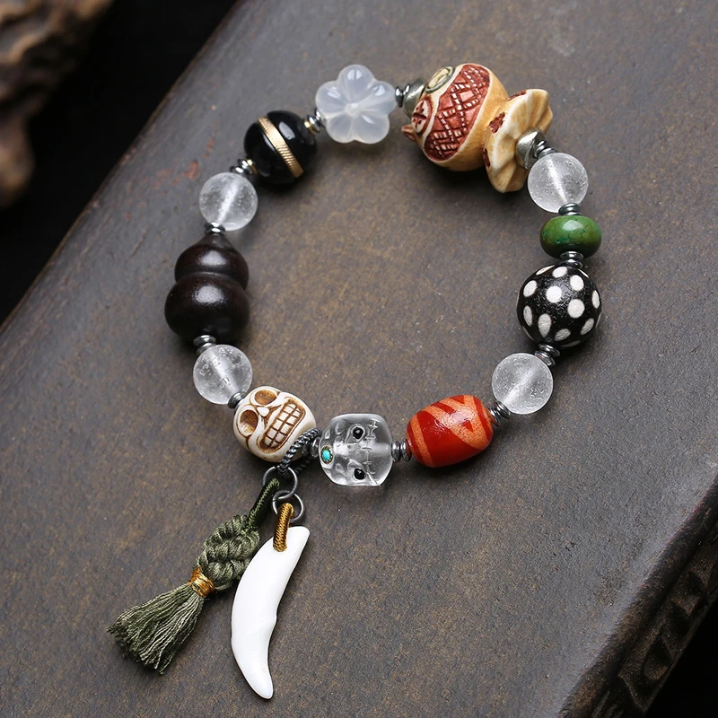 Natural agate glass multi-bead bracelet with vintage deer antler, Kintsuke ebony, gourd, and Dzi beads accessories