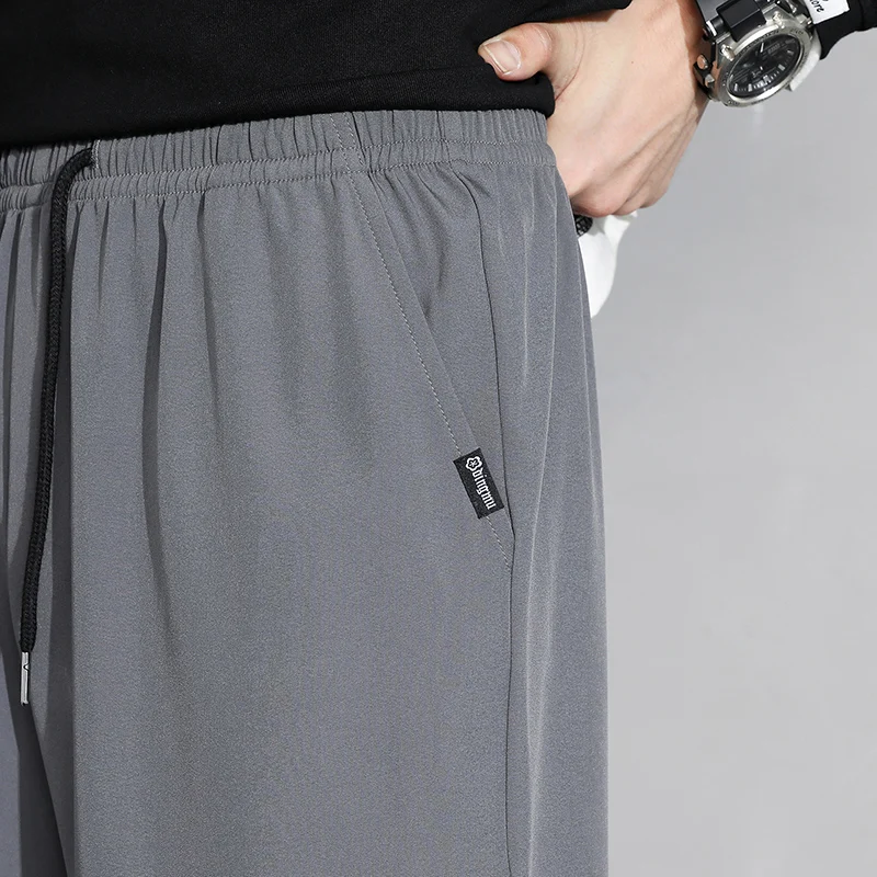 Lockere Herrenhose für Frühling und Herbst mit elastischem Bund und Kordelzug, lässige, einfarbige Hose, weich und atmungsaktiv