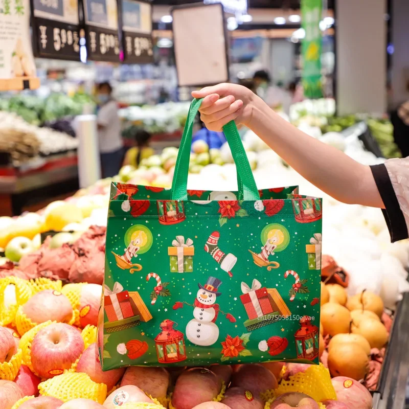 Borsa regalo di Natale Borse tote con fiocco di neve alce di Babbo Natale Borsa per imballaggio regalo di caramelle Borse impermeabili stampate in tessuto non tessuto addensato Regalo di Natale