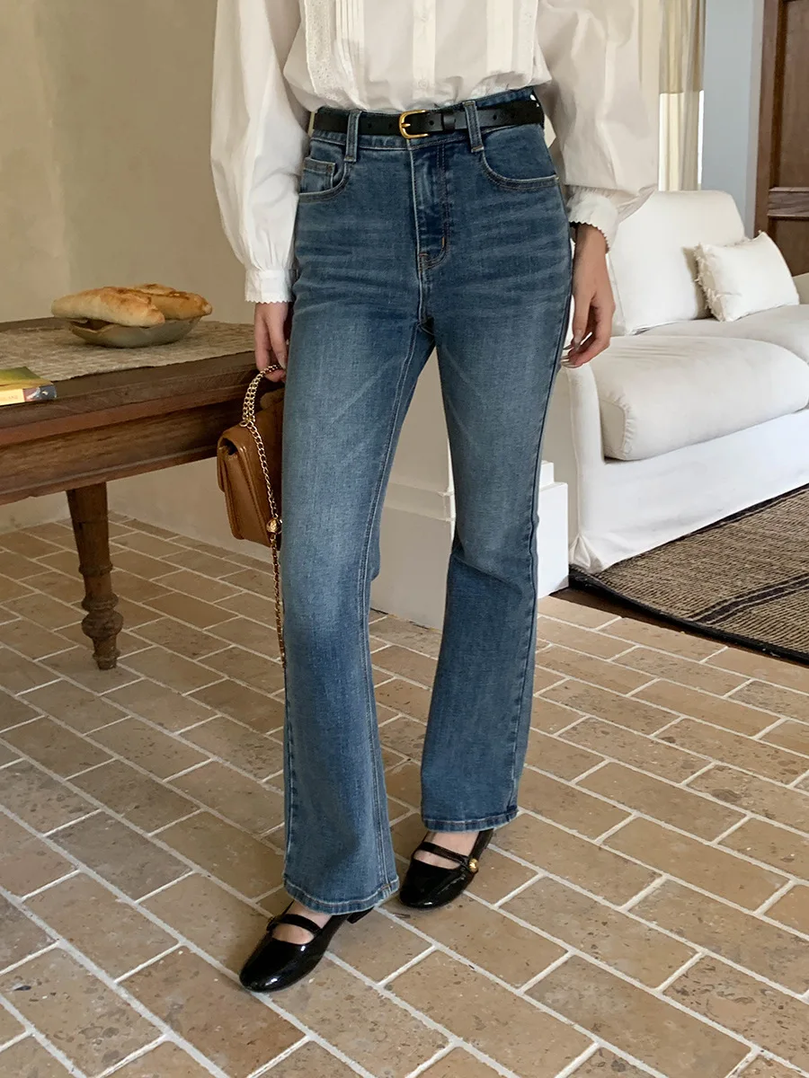 Jeans slim fit pinggang tinggi biru baru di awal musim gugur dengan efek pull up sedikit