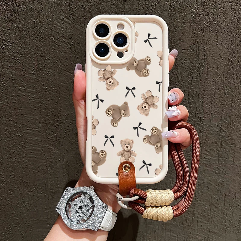 Niedliche Schleifenbär-Handyhülle mit Lanyard für iPhone 14 15 16 17 Pro Max 14 13 12 11 Pro Plus Stoßfeste Matte Silikonhülle – Detail 1