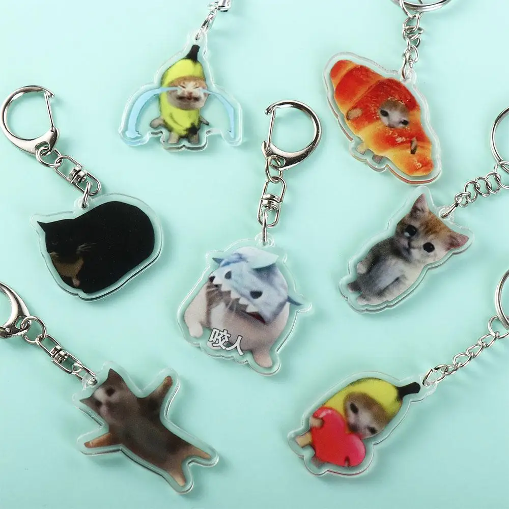 กล้วยแมว Happy Banana Cat พวงกุญแจกระเป๋าเป้สะพายหลัง Charm จี้กล้วยแมวโซ่โทรศัพท์มือถือ PVC การ์ตูนกล้วยแมวจี้