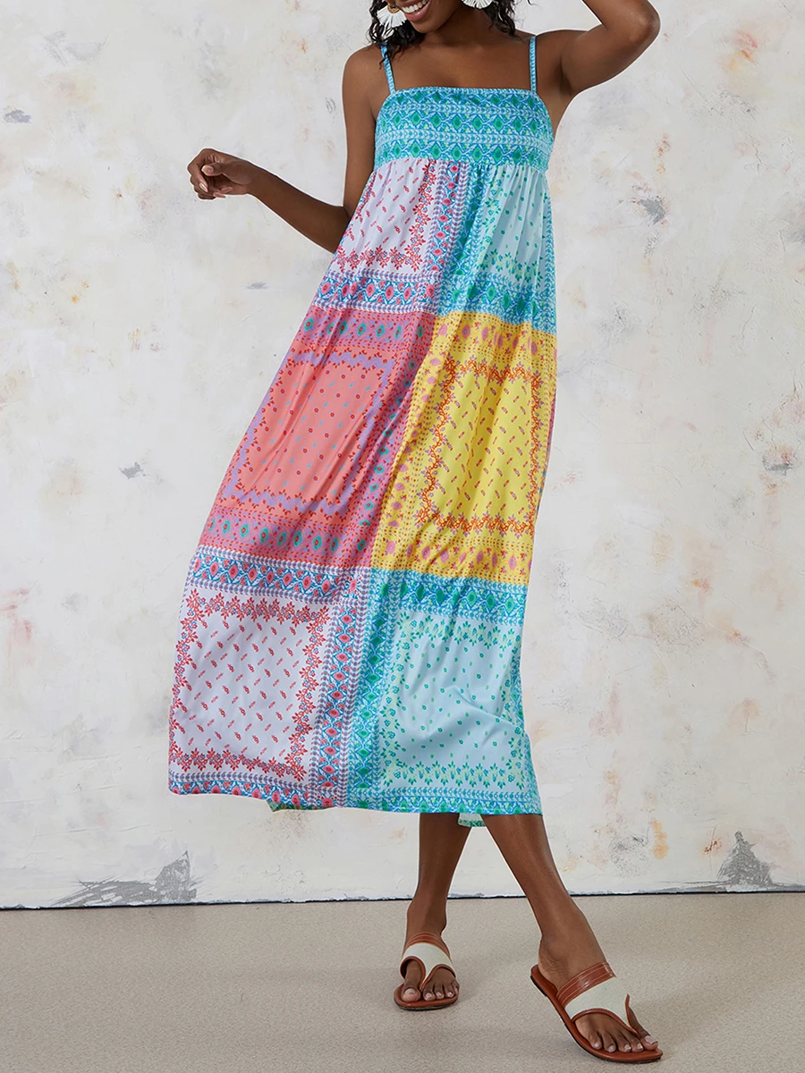 ชุดเดรสยาวโบฮีเมียนของผู้หญิงฤดูร้อนแขนกุดสายสปาเก็ตตี้ขอบพิมพ์ชุดเดรสชายหาด Flowy