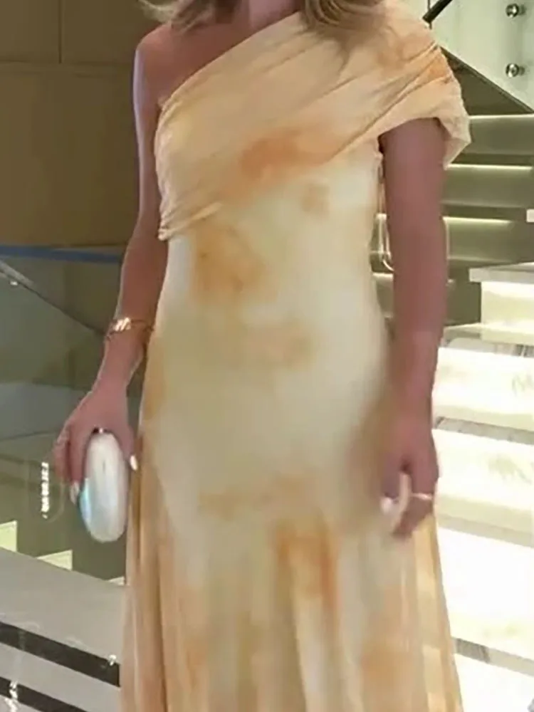 女性用エレガントなハイウエストドレープロングドレス、ファッショナブルな柄プリント、バックレススリムドレス、セクシーな斜め肩ノースリーブボヘミアン風ドレス