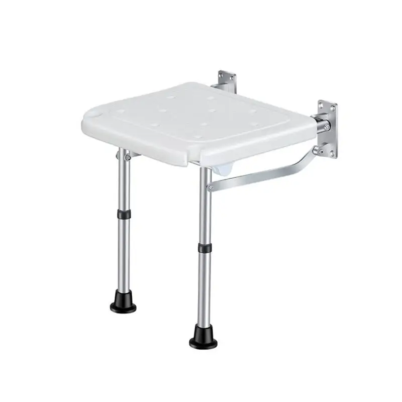 

Squatting is changed to sitting. Wall-mounted toilet chair is folded against the wall. Elderly toilet toilet chair squatting
