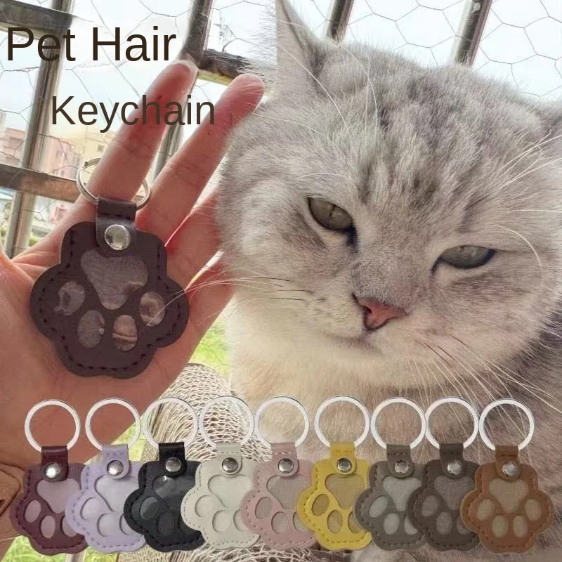 A leather pet fur storage bag, which can be used as a hanging ornament for a cat's paws, and has multiple functions, being a por