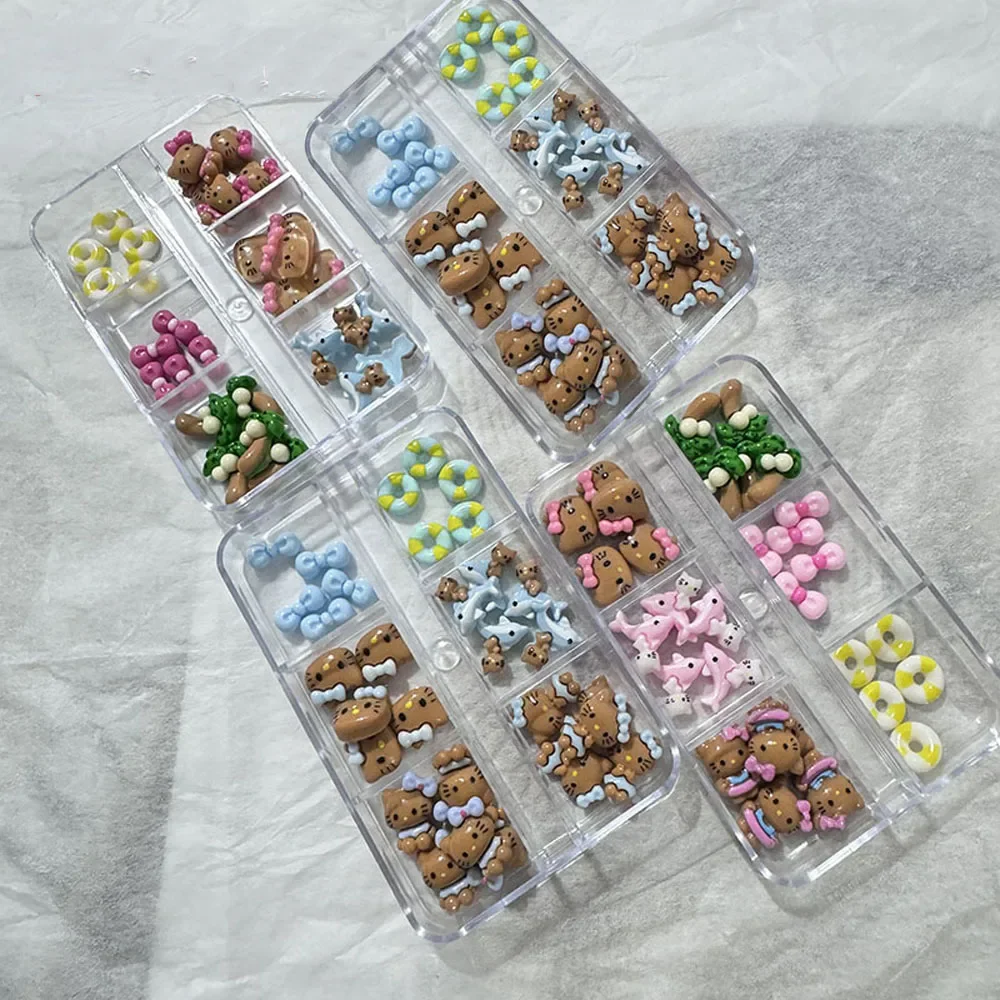12 grilles dessin animé bronzage Kitty breloques pour ongles 3D peau noire hawaïenne HelloKitty décorations pour ongles y2k arc Hello Kitty strass pour ongles