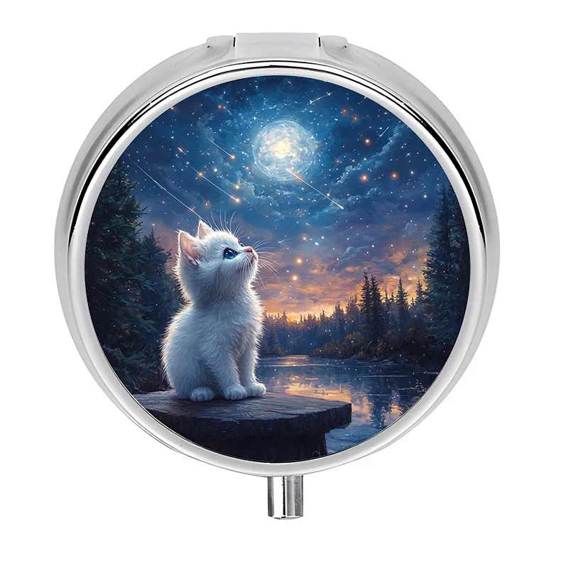 A Small Pill Box Divided into Three Sections, Decorated with a Charming Cat Gazing at the Stars, the Reflection of a Lake, and the Outline of a Forest. This Decorative Metal Box Is Perfect for Carrying Medications and Vitamins, Especially during Travel or for Daily Use.