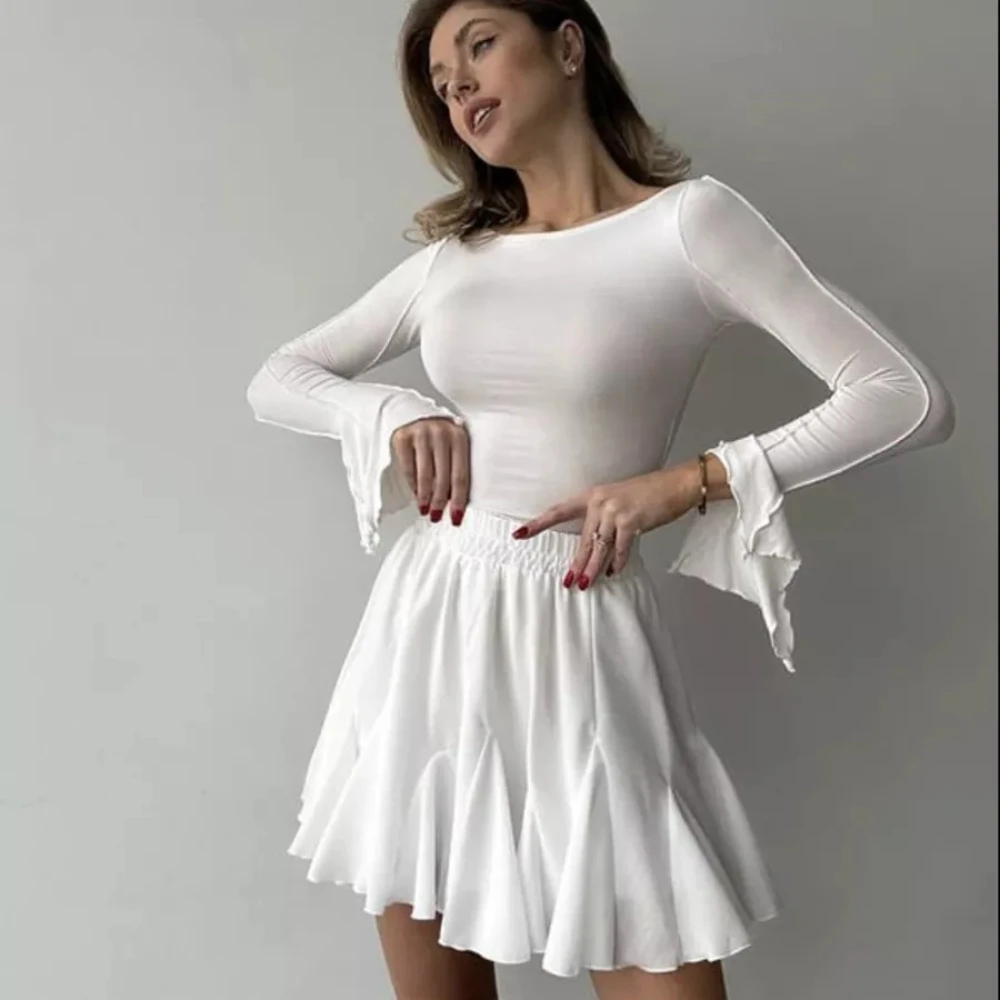 Minifalda blanca con volantes para mujer, faldas cortas plisadas y esponjosas de cintura alta, ropa de calle para fiesta, 2024