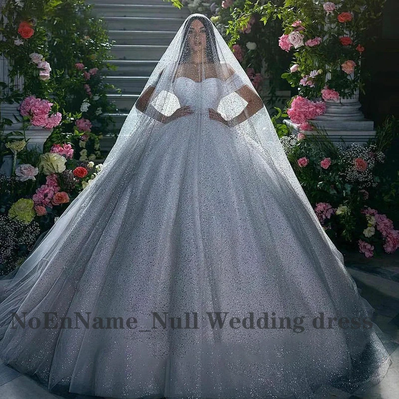 Abito da sposa principessa di lusso abito da sposa da donna in Tulle glitterato abito da sposa Robe De Mariee Off spalla arabo Dubai d'aria