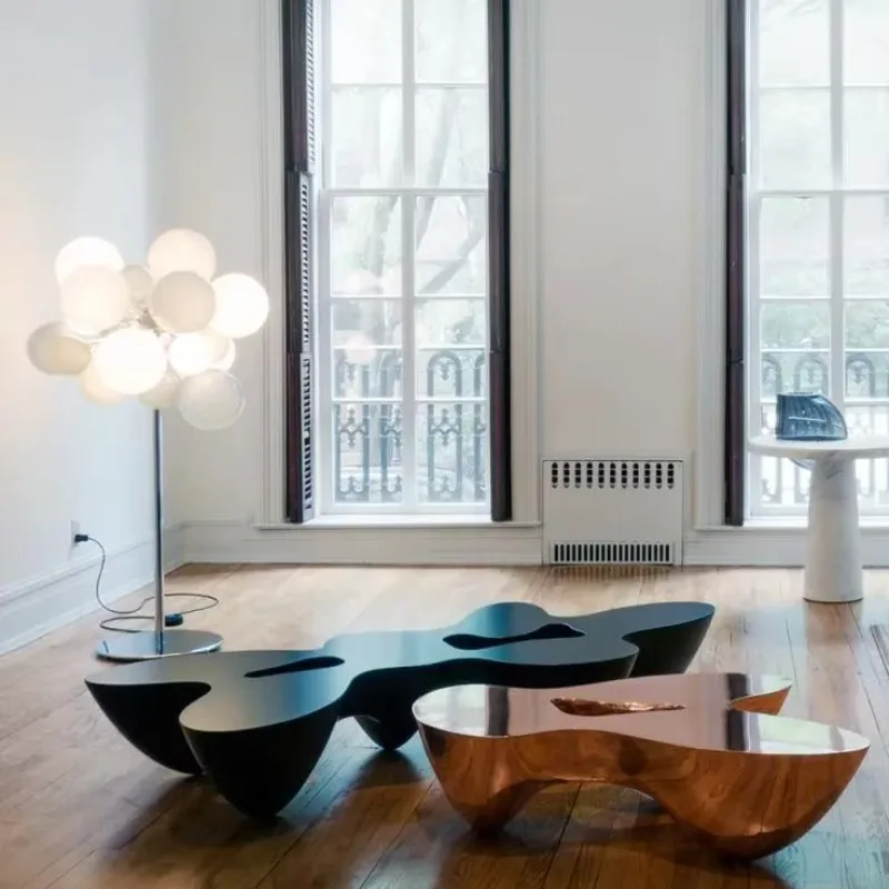 

Modern creative light luxury fiberglass special-shaped quark triangle coffee table tea