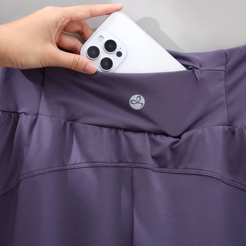 PHIGEER Mulheres verão secagem rápida correndo shorts leve lounge atlético esportes curto solto ajuste longo yoga shorts com bolsos