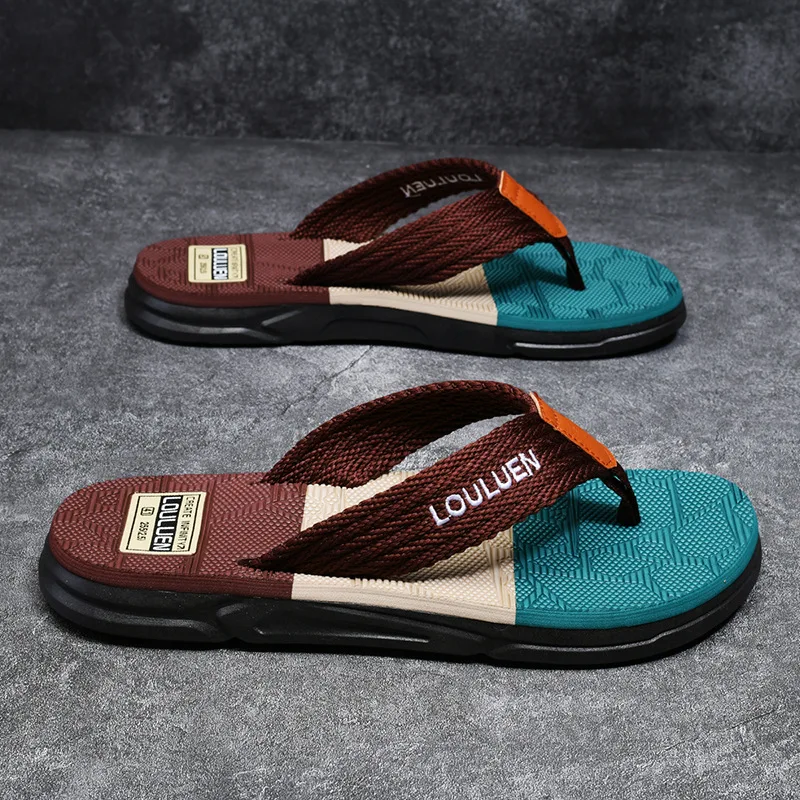 

Textured Geometric Grip Men's Flip Flops - Woven Double-Tone Straps & Sea-Green Shock-Absorbing Sole with Color-Popping Accent​
