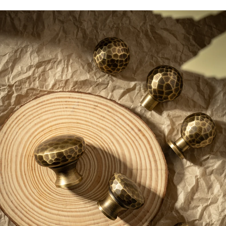 Hammered brass cabinet knob in antique brushed finish — product image 2