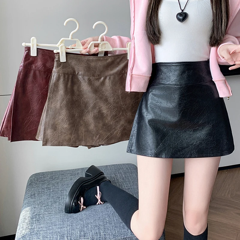 秋冬レザーミニスカート女性ファッションストリートウェア Y2K スカートショーツサイドスリットセクシーなキュロット A ラインナイトパーティースカート