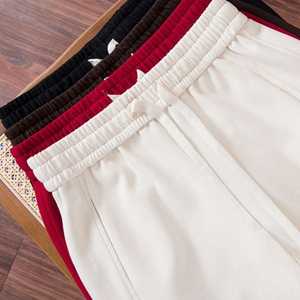 Spodnie damskie w stylu europejskim, w kolorze wina, z motywem banana, jesienno-zimowe, nowe, wysokiej jakości, bawełniane, modne, plus size, sportowe i rekreacyjne.