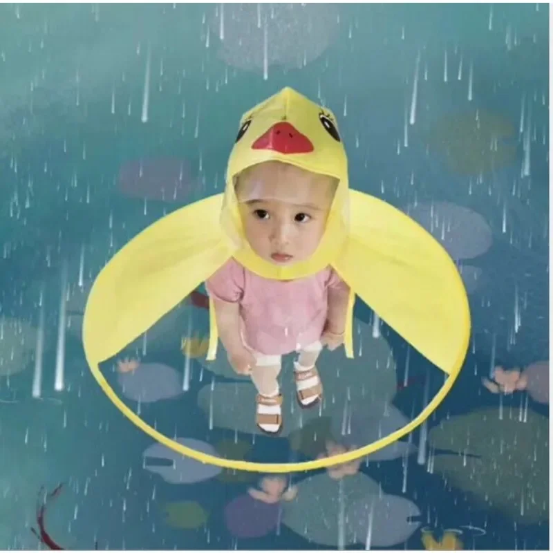 

Cute Raincoat Cartoon Duck Kids Rain Coat UFO Children Umbrella Hat Magical Hands Free Tops Boys And Girls Windproof Rainwear