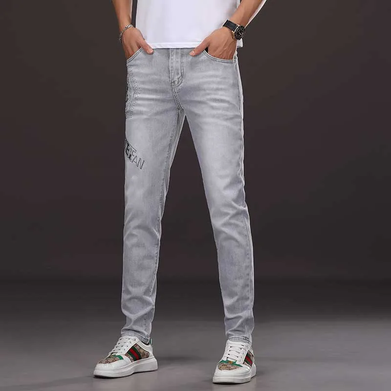 

CJ8817 European style hot stamping printed denim jeans with distressed craftsmanship, men's slim fit and elastic small feet