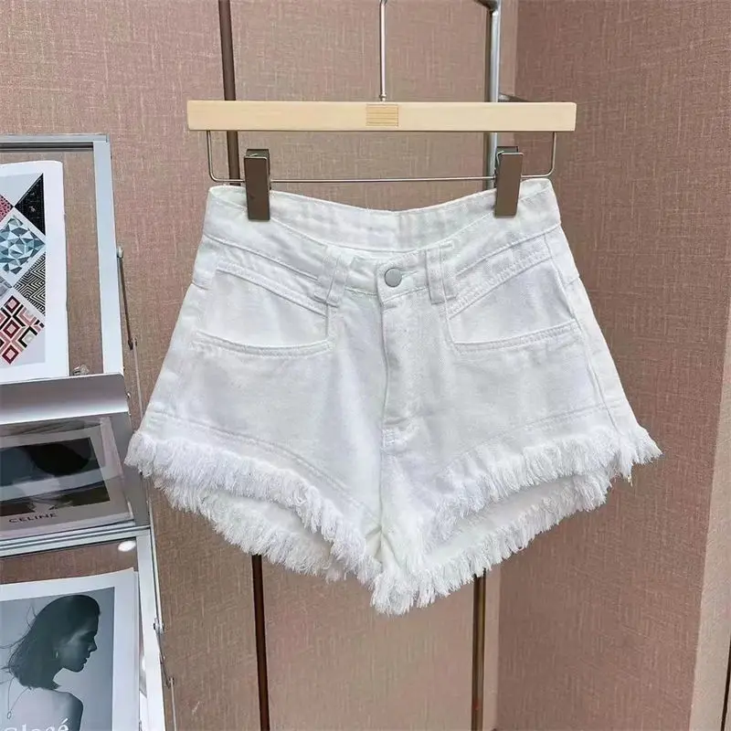 Short en jean taille haute avec pompon pour femme, jean coréen, trous déchirés, 4 couleurs, été, nouveau, 2024