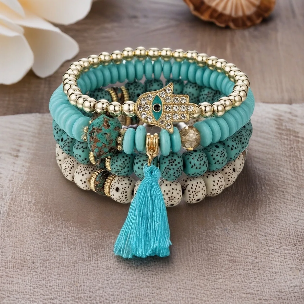4-teiliges Armband-Set mit dem Motiv des „bösen Auges“ für Damen, mit Kristallanhänger in Form der Hand Fatimas, Quasten, elastischen Perlen und Kettengliedern, Herren-Modeschmuck und Accessoires. – Detail 4