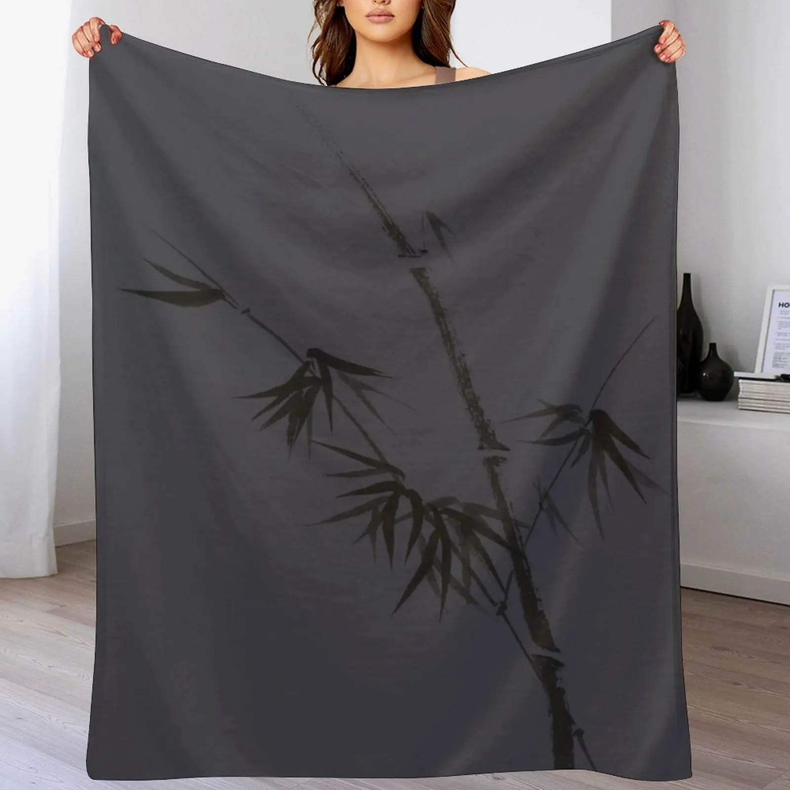 

Exquisite artistic design in oriental Japanese Zen style of bamboo stalk on dark space gray background art print Throw Blanket