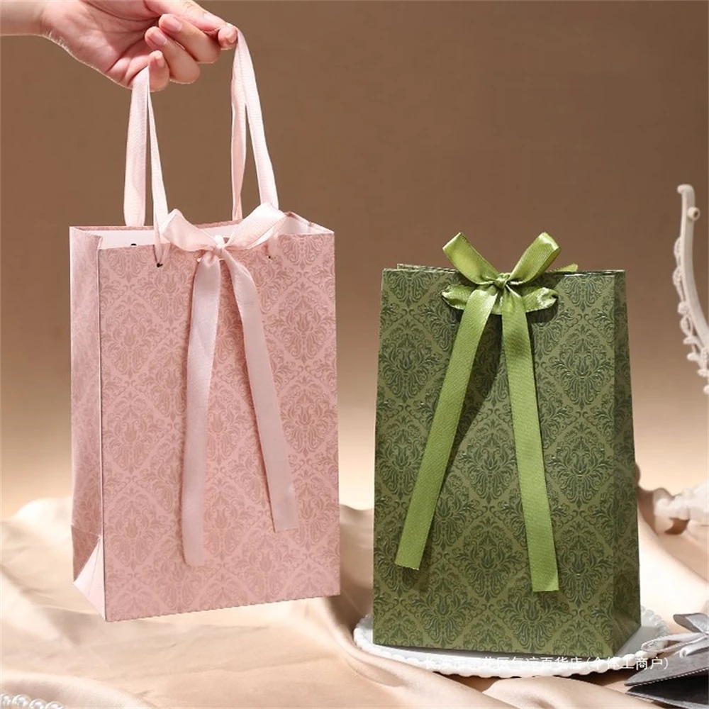

10Pcs Light Luxury Green Gift Bags - Retro Handbag Design for Lipstick, Perfume, Jewelry, Gift Packaging