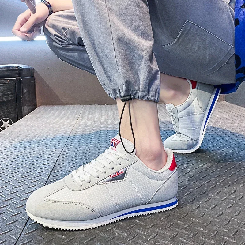Sznurowane męskie buty do tenisa sportowego na świeżym powietrzu Zapatillas Hombre Lekkie buty do biegania dla mężczyzn Designerskie siatkowe