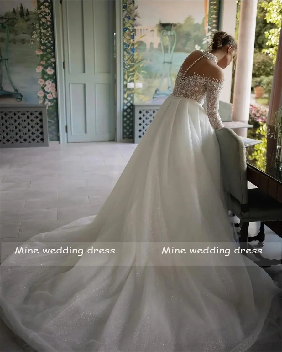 Customized High Neck Lace Appliques  With peals For Top Long Sleeve Glitter Skirt Wedding Dresses Back See Through Bridal Gowns