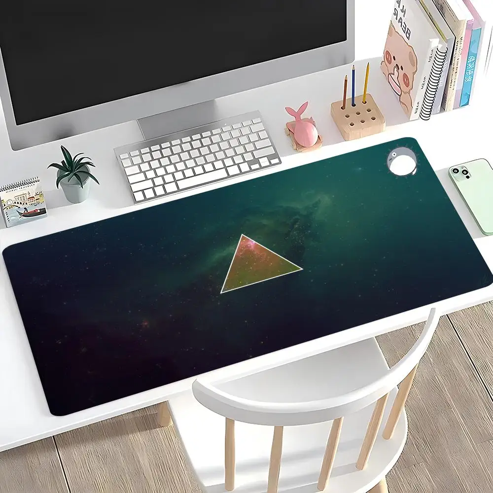 

Large mouse pad - White triangle frames colorful space stuff on a dark cosmic background.