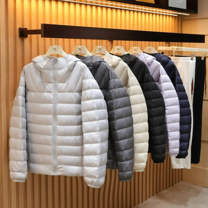 Autumn and winter new men's couple's light outdoor sports travel ribs hooded down jacket