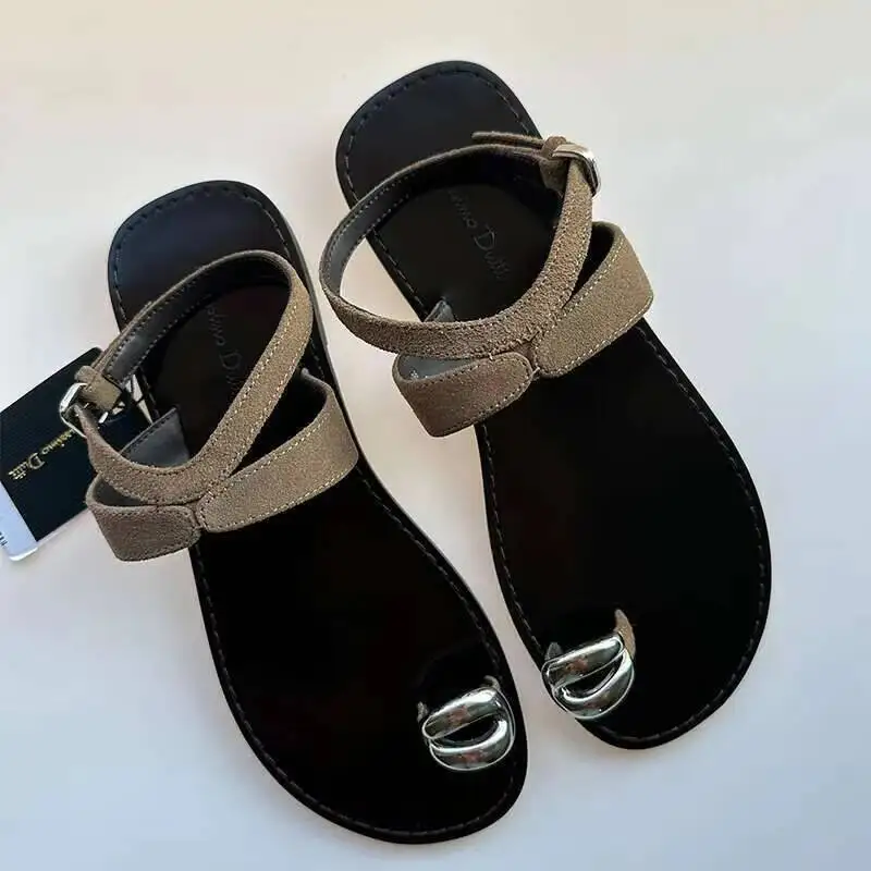 

High quality classic sandals in the summer of 2025, retro metal decorated Roman flat female women genuine leather shoes