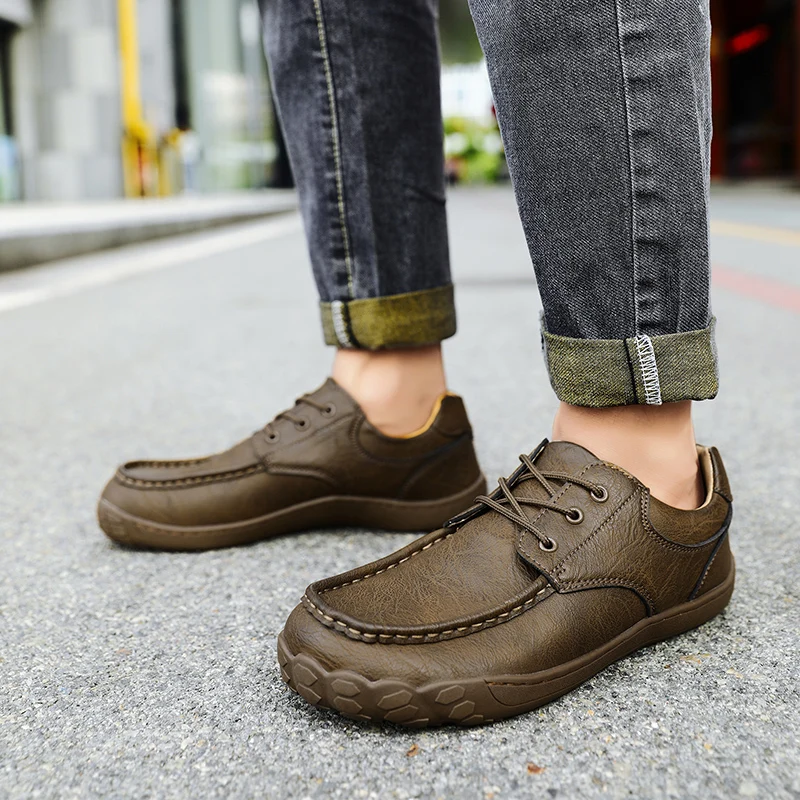 Mocasines Damyuan para hombre, novedad de 2024, zapatos sin cordones con punta redonda, zapatos planos suaves de cuero para caminar al aire libre para hombre, zapatillas de deporte de talla grande